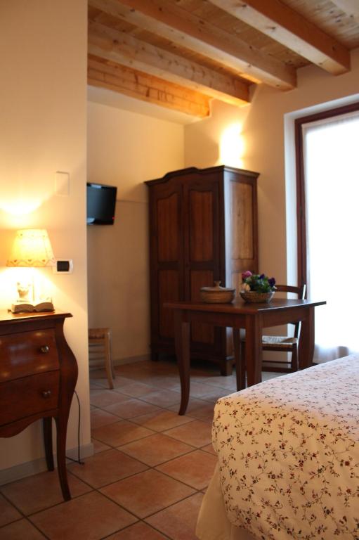 Postel nebo postele na pokoji v ubytování Agriturismo Al Barco