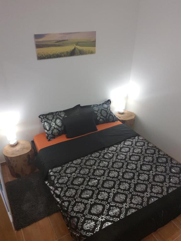 Postel nebo postele na pokoji v ubytování Apartman Lena