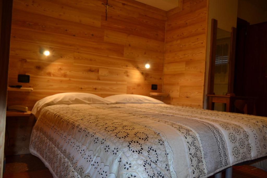 Postel nebo postele na pokoji v ubytování Albergo Cioccarelli