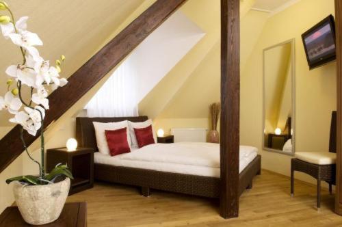 Postel nebo postele na pokoji v ubytování GuestHouse Heidelberg