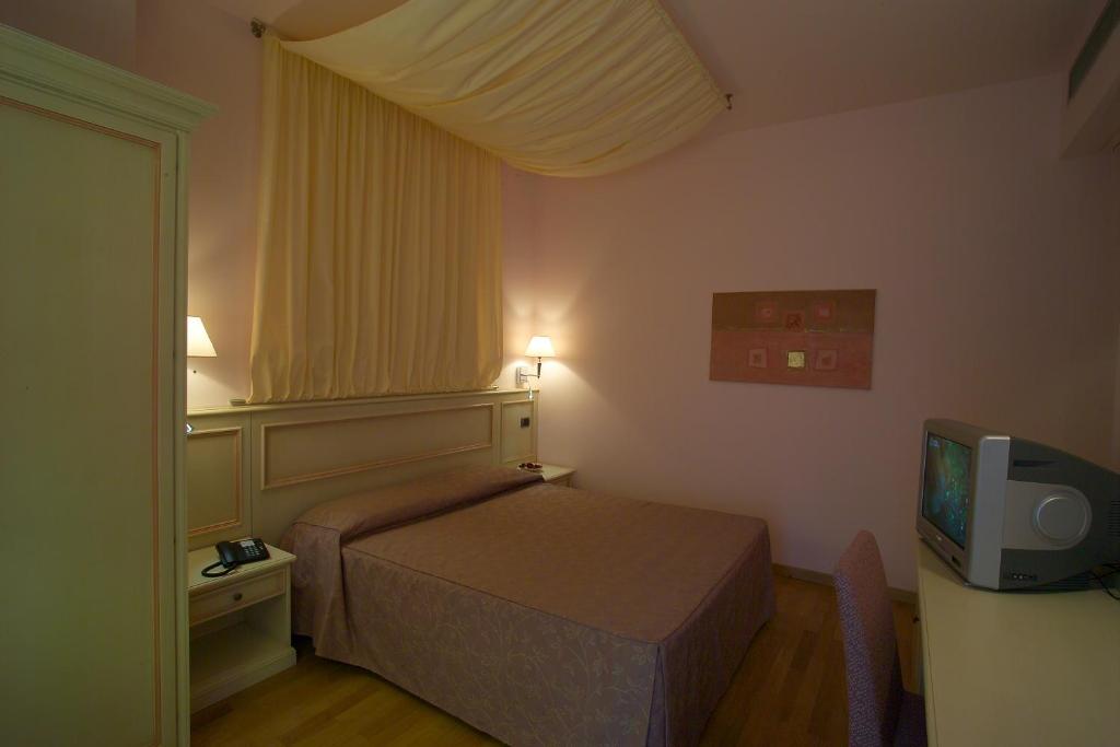 Postel nebo postele na pokoji v ubytování West Florence