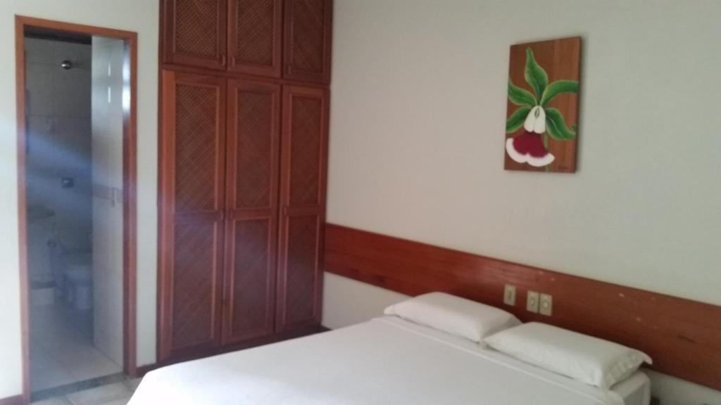 Postel nebo postele na pokoji v ubytování Quiriri Park Hotel