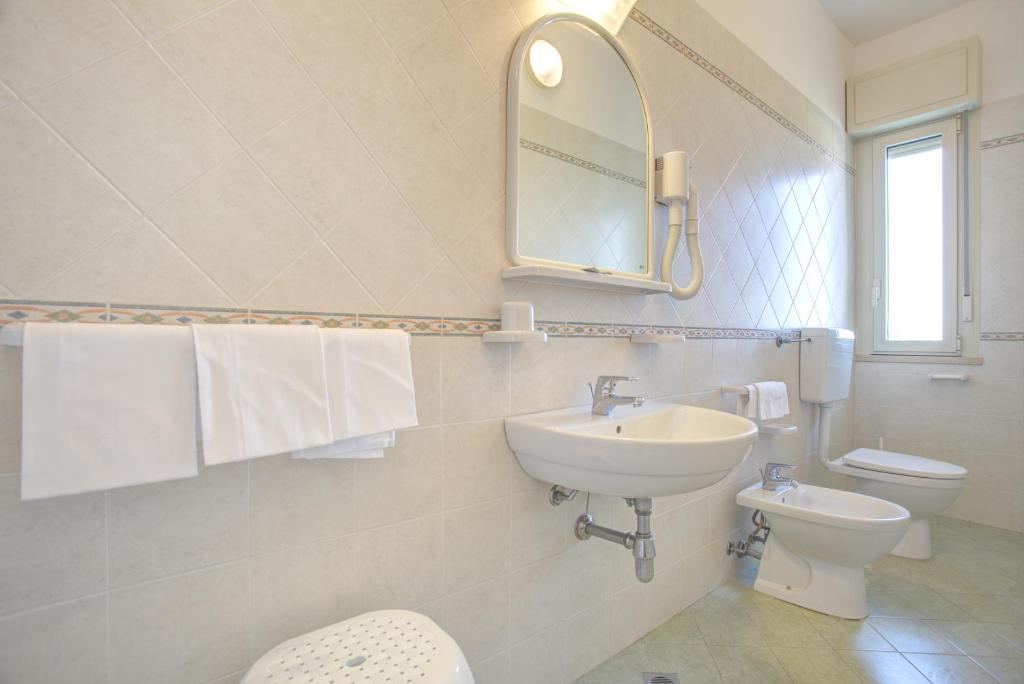 Kúpeľňa v ubytovaní Hotel Amedea