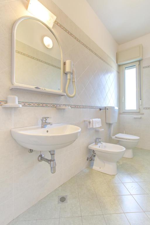 Kúpeľňa v ubytovaní Hotel Amedea