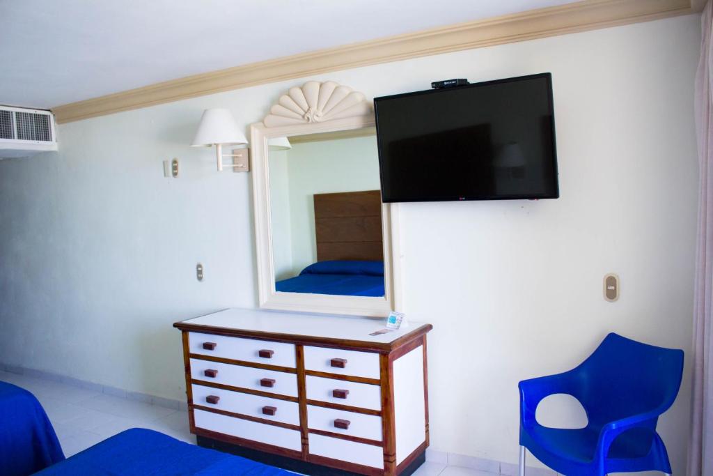 TV a/nebo společenská místnost v ubytování Hotel Sands Arenas