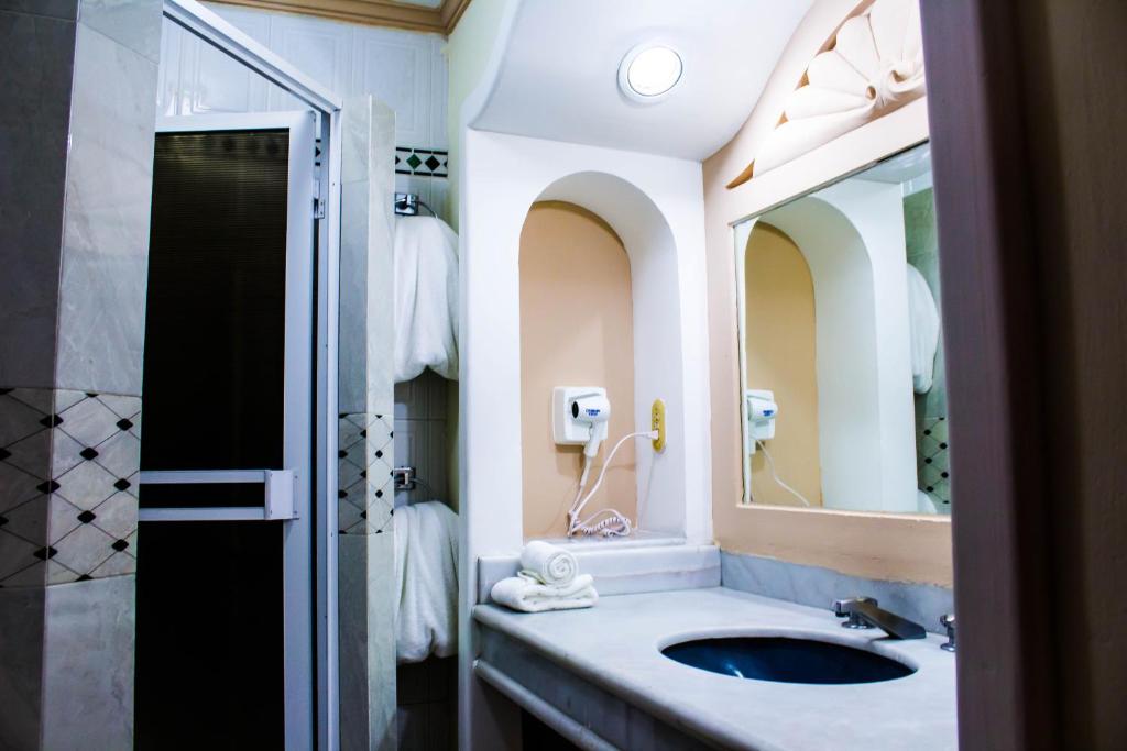 Koupelna v ubytování Hotel Sands Arenas