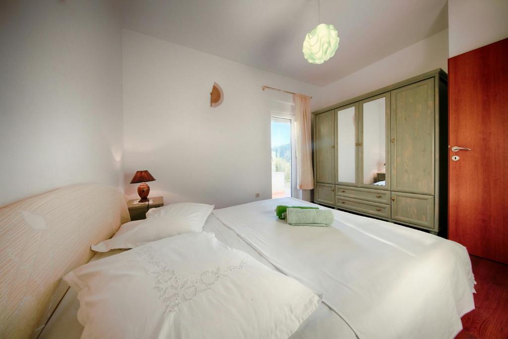 Postel nebo postele na pokoji v ubytování Apartment Diva