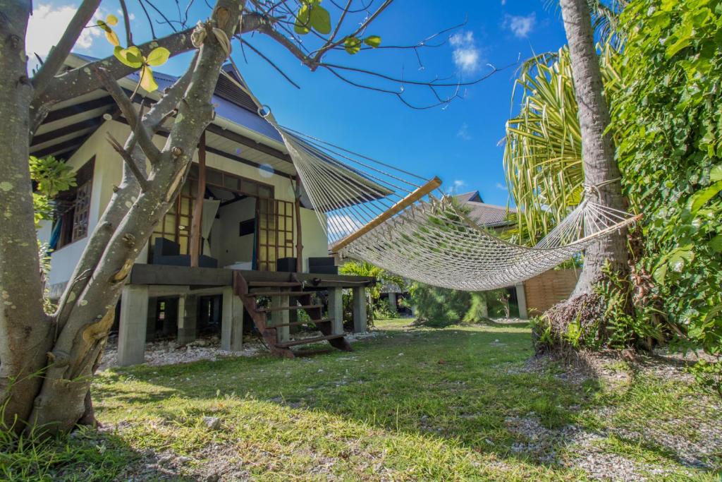 Κήπος έξω από το Le Coconut Lodge