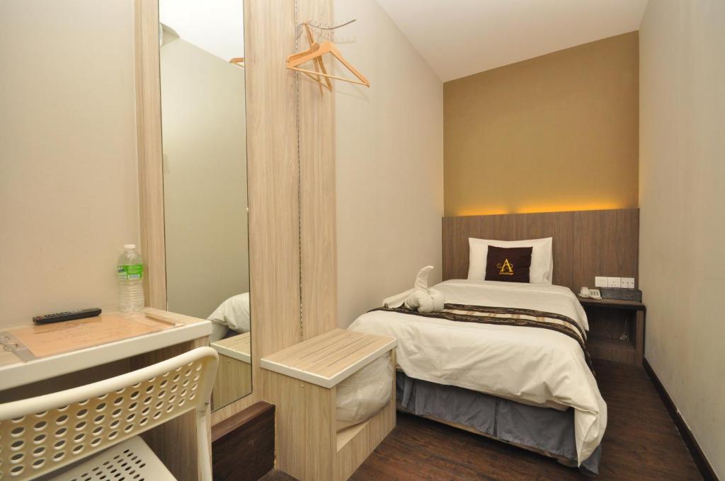 Postel nebo postele na pokoji v ubytování Art Cottage Hotel