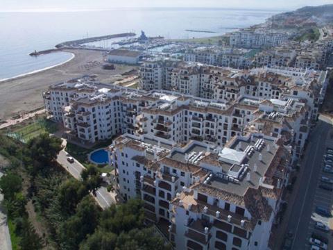 an aerial view of a city with a beach and buildings at Marina de la duquesa 602 in Castillo de Sabinillas