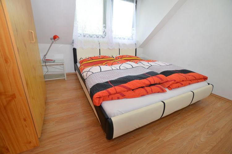 Postel nebo postele na pokoji v ubytování Apartma Štastný