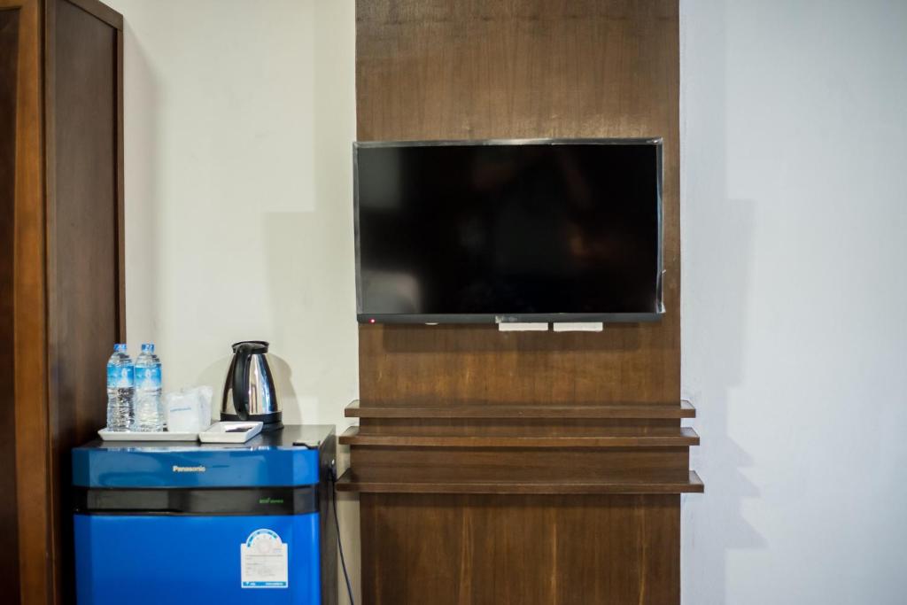 TV a/nebo společenská místnost v ubytování Lanta Nice Beach House