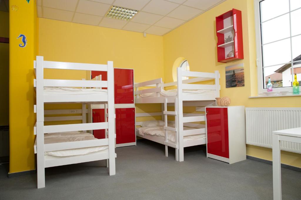 Postel nebo postele na pokoji v ubytování ALL SEASONS - HOSTEL