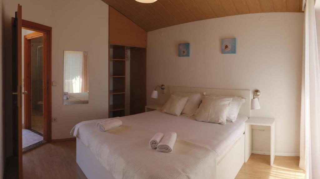 Postel nebo postele na pokoji v ubytování SD House