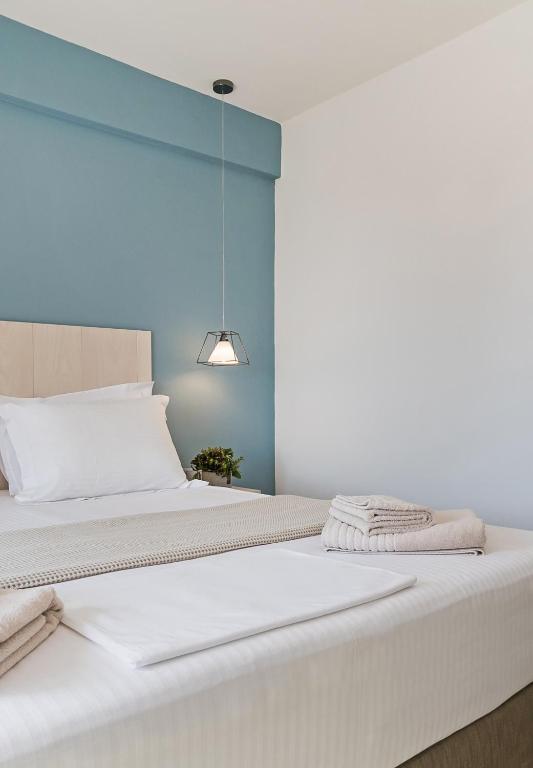 Postel nebo postele na pokoji v ubytování Lidea Boutique Hotel