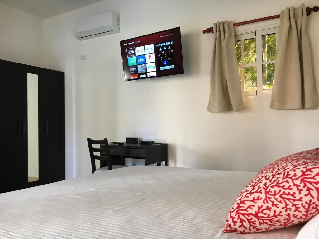 Postel nebo postele na pokoji v ubytování Coral Blanco Hotel