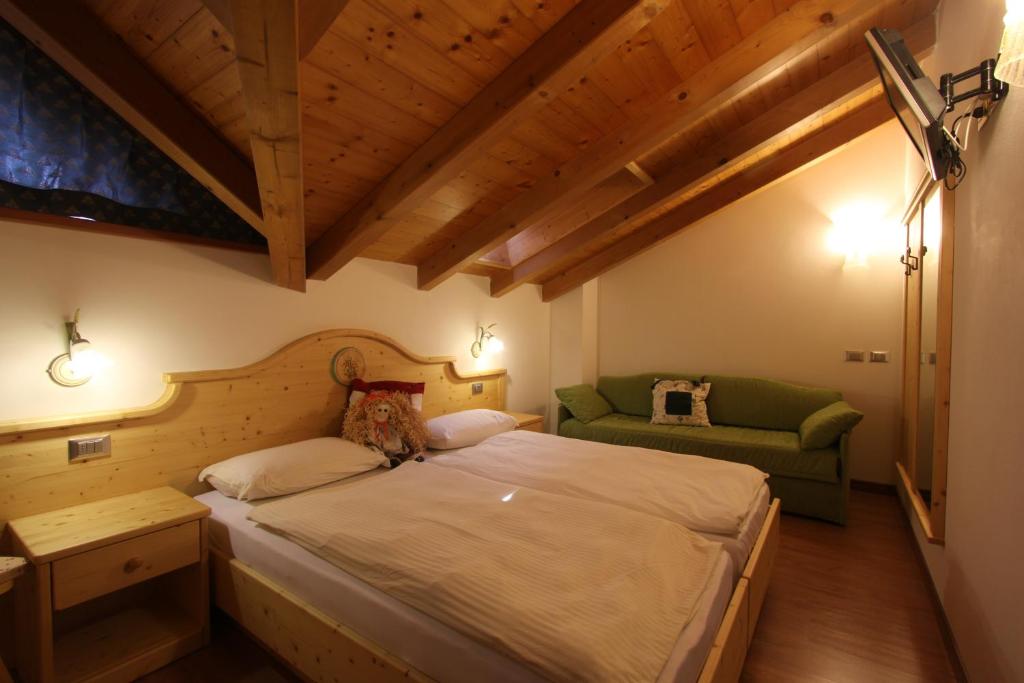 Postel nebo postele na pokoji v ubytování B.& B. Corradini