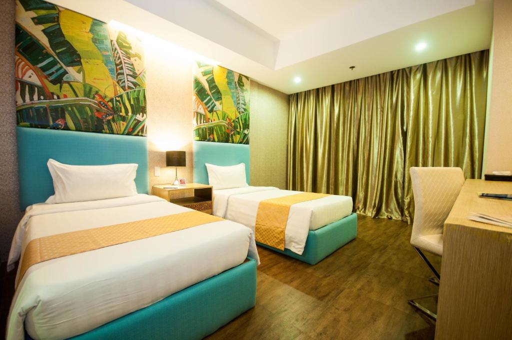 Postel nebo postele na pokoji v ubytování Aziza Paradise Hotel