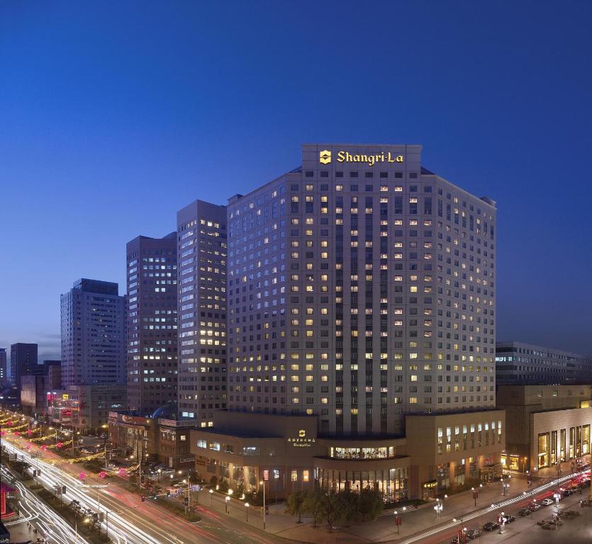 a large building with a samsung sign on top of it at Shangri-La Changchun in Changchun