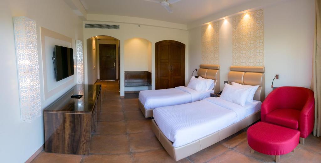Кровать или кровати в номере The Ivy Anjuna
