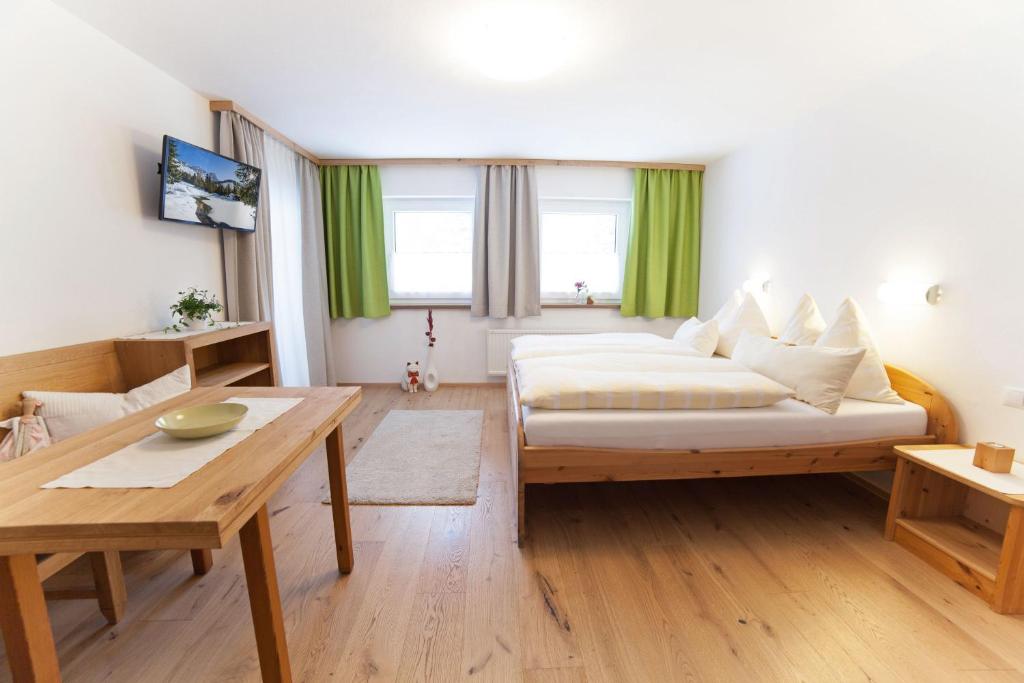 Postel nebo postele na pokoji v ubytování B&B Landhaus Vierthaler