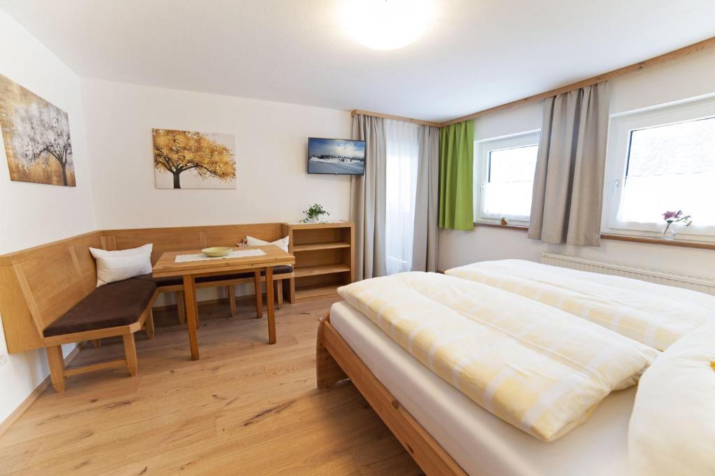 Postel nebo postele na pokoji v ubytování B&B Landhaus Vierthaler