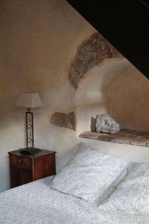 Posteľ alebo postele v izbe v ubytovaní l'Atelier de Saint-Just