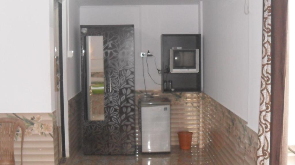 Kuchyň nebo kuchyňský kout v ubytování Leon Hide Out Guest House
