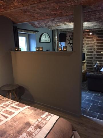 Postel nebo postele na pokoji v ubytování Gîte de Corbion Loft1