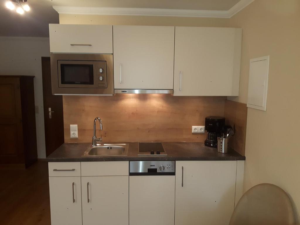 Kuchyň nebo kuchyňský kout v ubytování Gästehaus Knunbauer