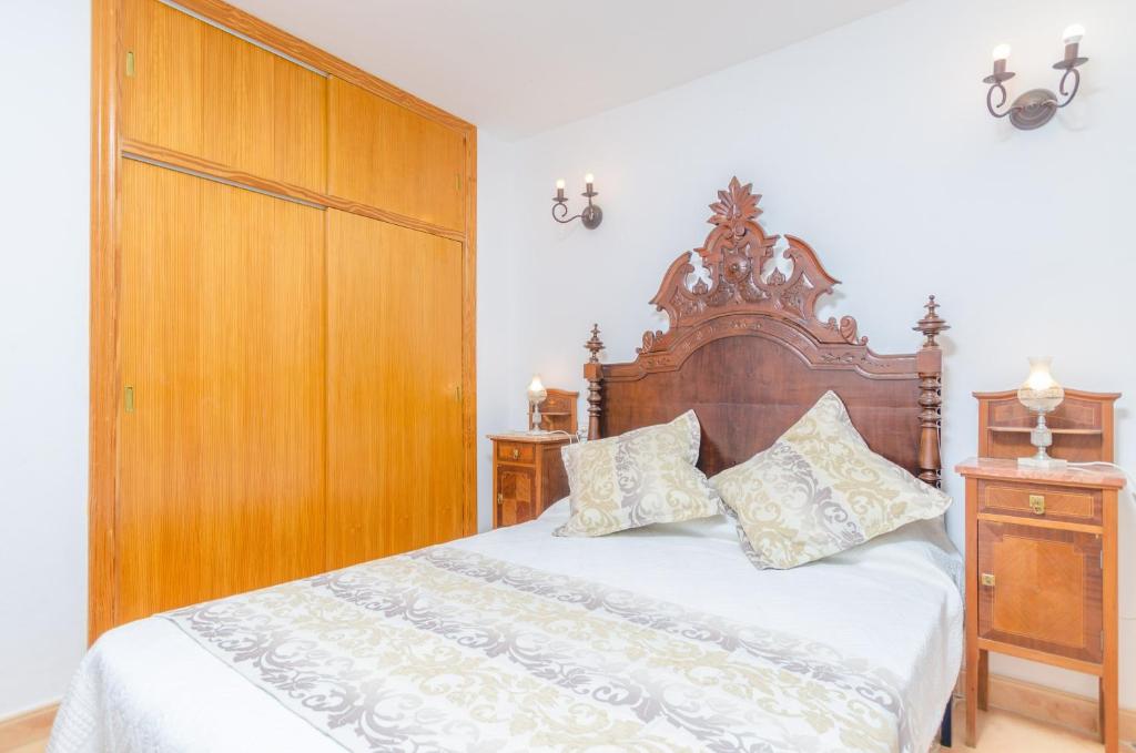A bed or beds in a room at Can Reure (Can Paris)