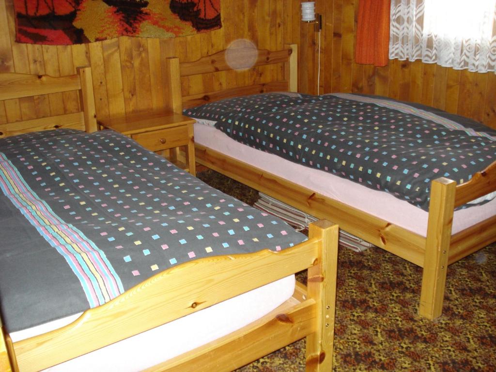 Postel nebo postele na pokoji v ubytování Chalet Alphütte
