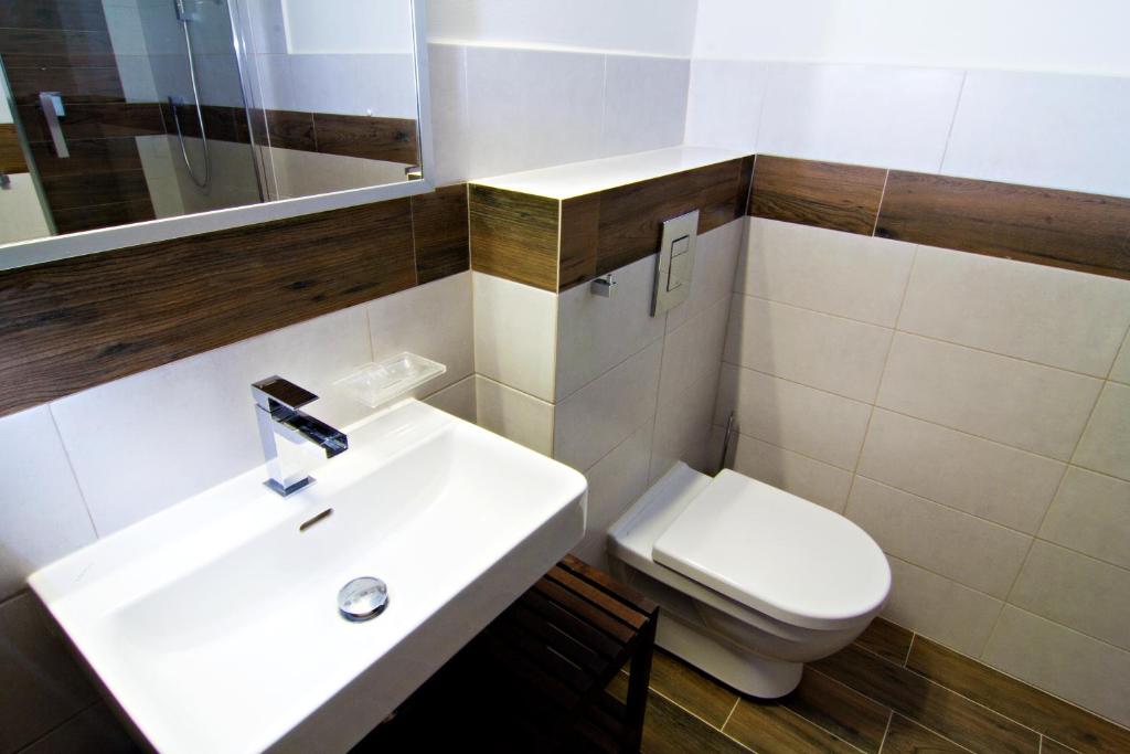 Koupelna v ubytování Apartmány Chata Švadlenka