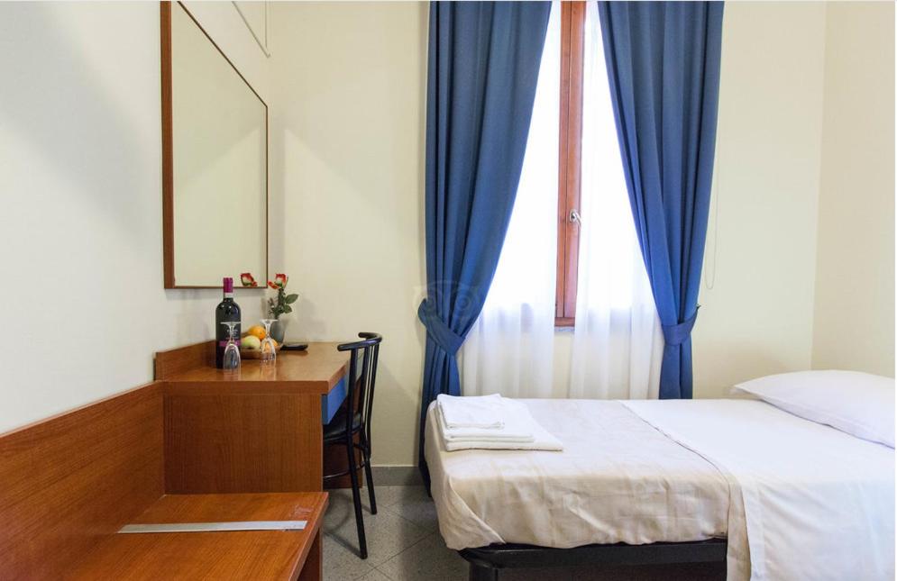 Cama o camas de una habitación en Hotel Greco