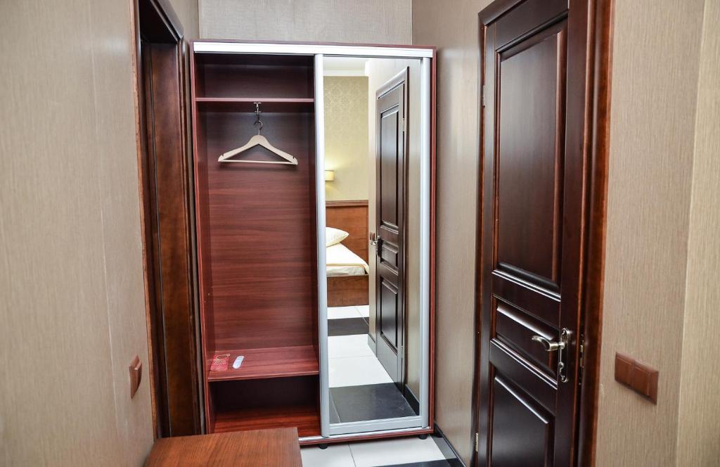 Postel nebo postele na pokoji v ubytování Nashe Misto Guest House