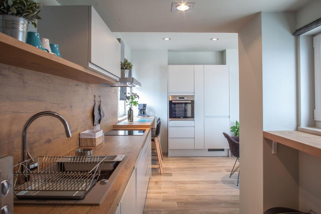 Kuchyňa alebo kuchynka v ubytovaní Apartments Vranjes Deluxe