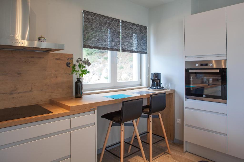 Kuchyňa alebo kuchynka v ubytovaní Apartments Vranjes Deluxe