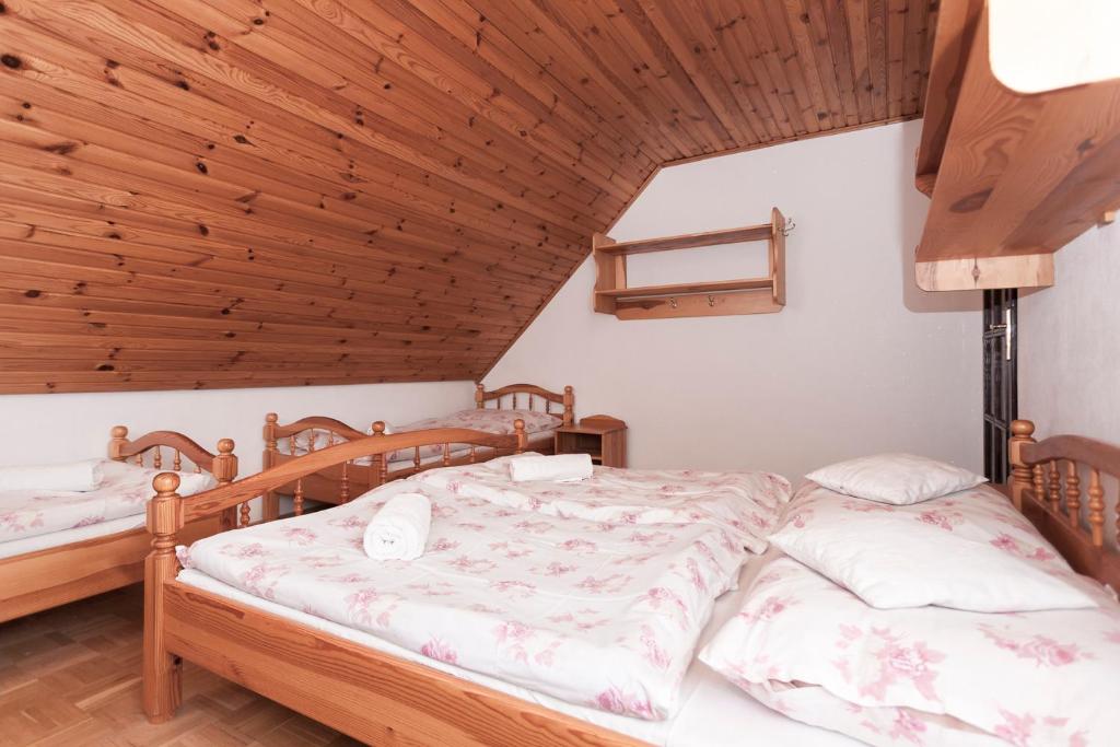A bed or beds in a room at Privát Gallik