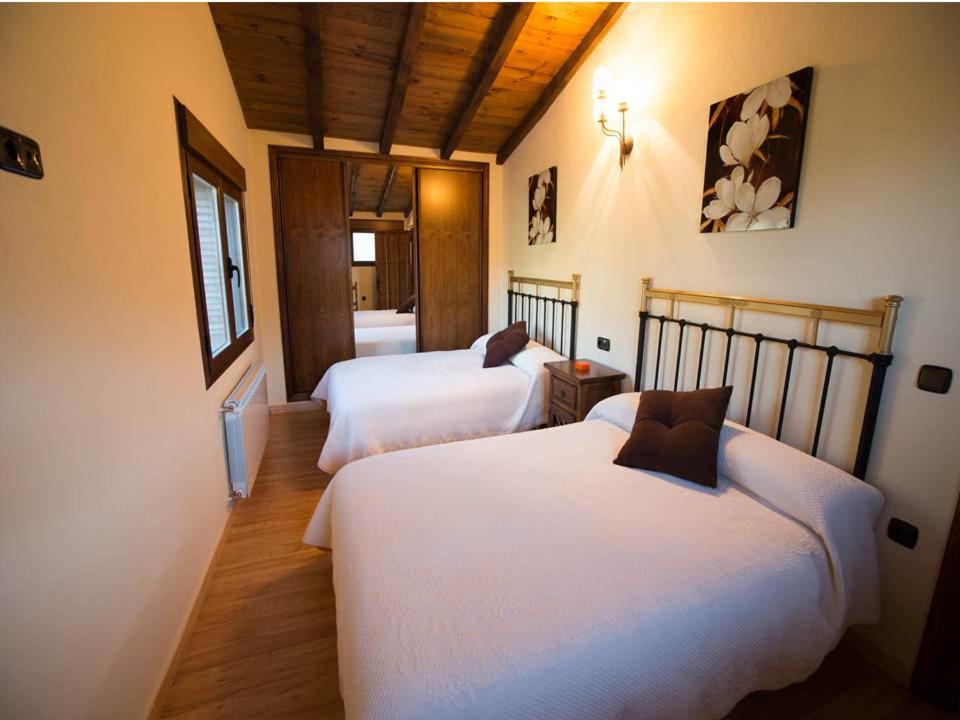 Posteľ alebo postele v izbe v ubytovaní Casa Rural Apartamento Las Malpicas