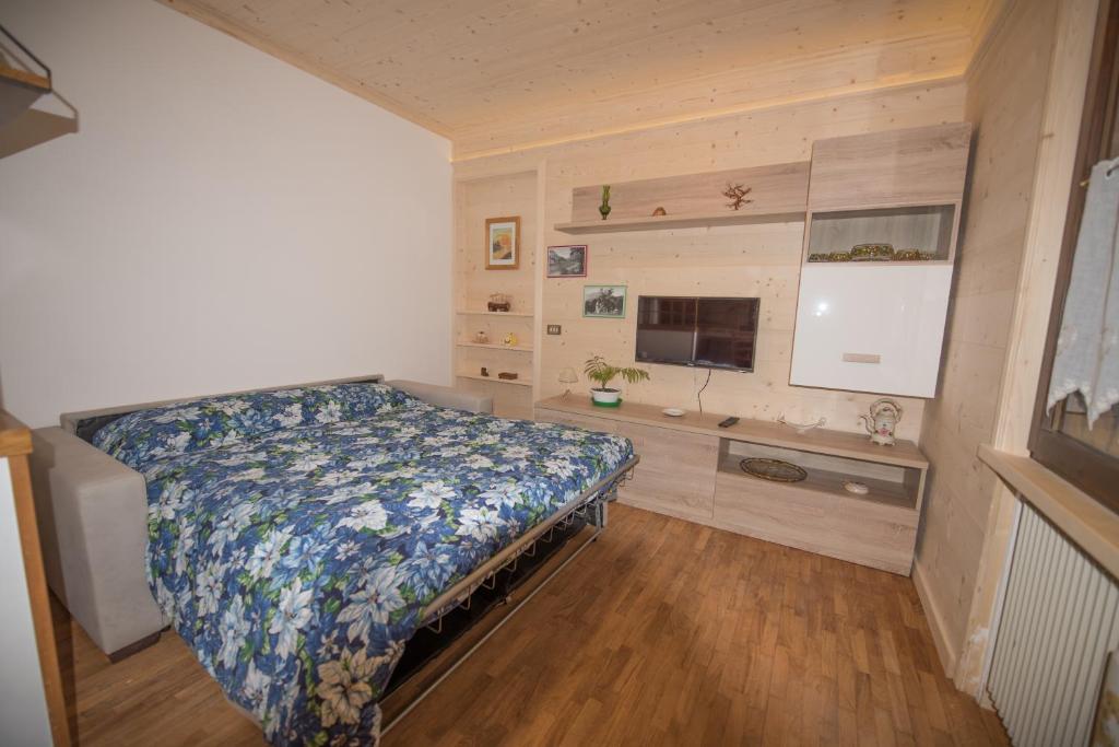 Postel nebo postele na pokoji v ubytování casa per vacanze Letizia