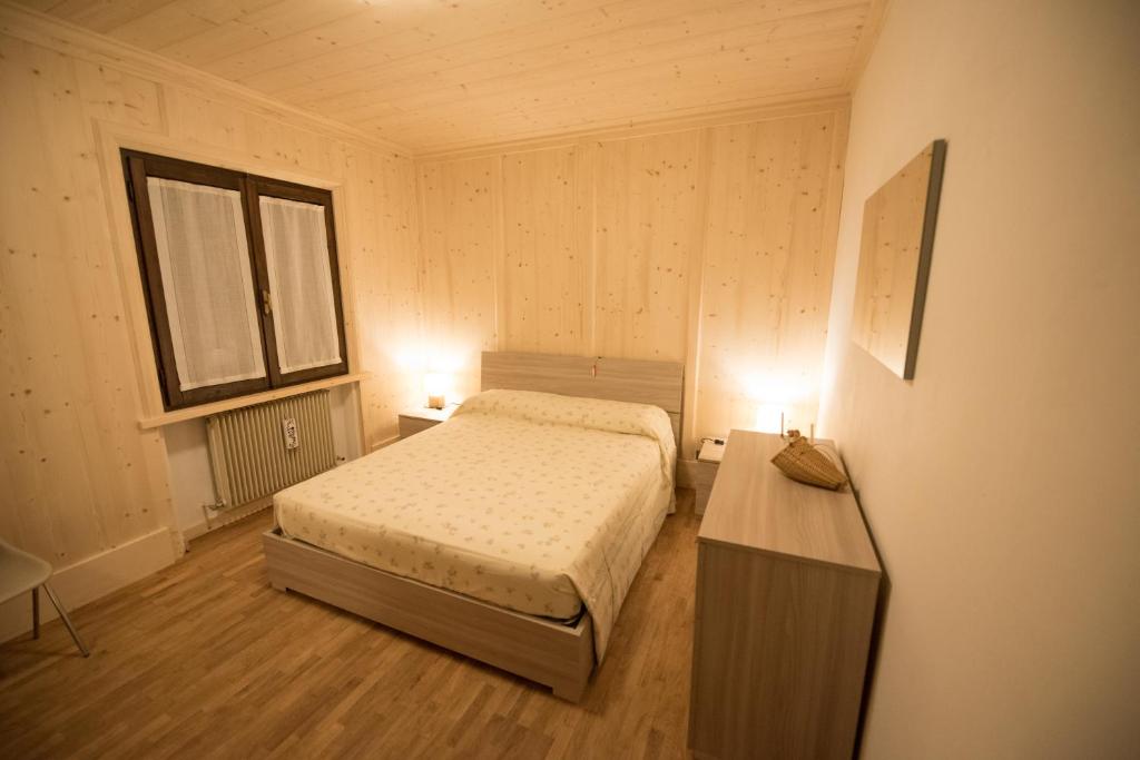 Postel nebo postele na pokoji v ubytování casa per vacanze Letizia