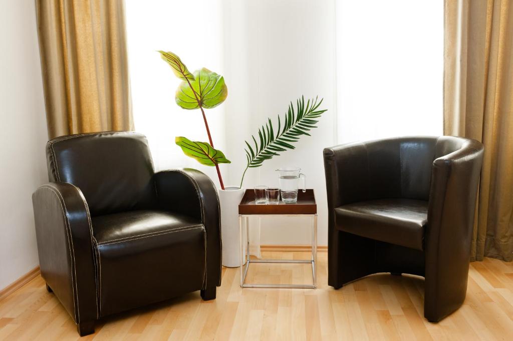Posezení v ubytování VOX Design Hotel