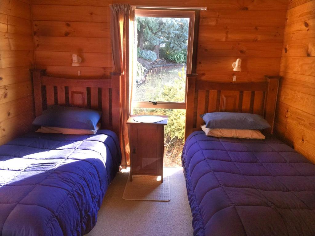 Postel nebo postele na pokoji v ubytování Pukaki Lakeside Getaway NZ