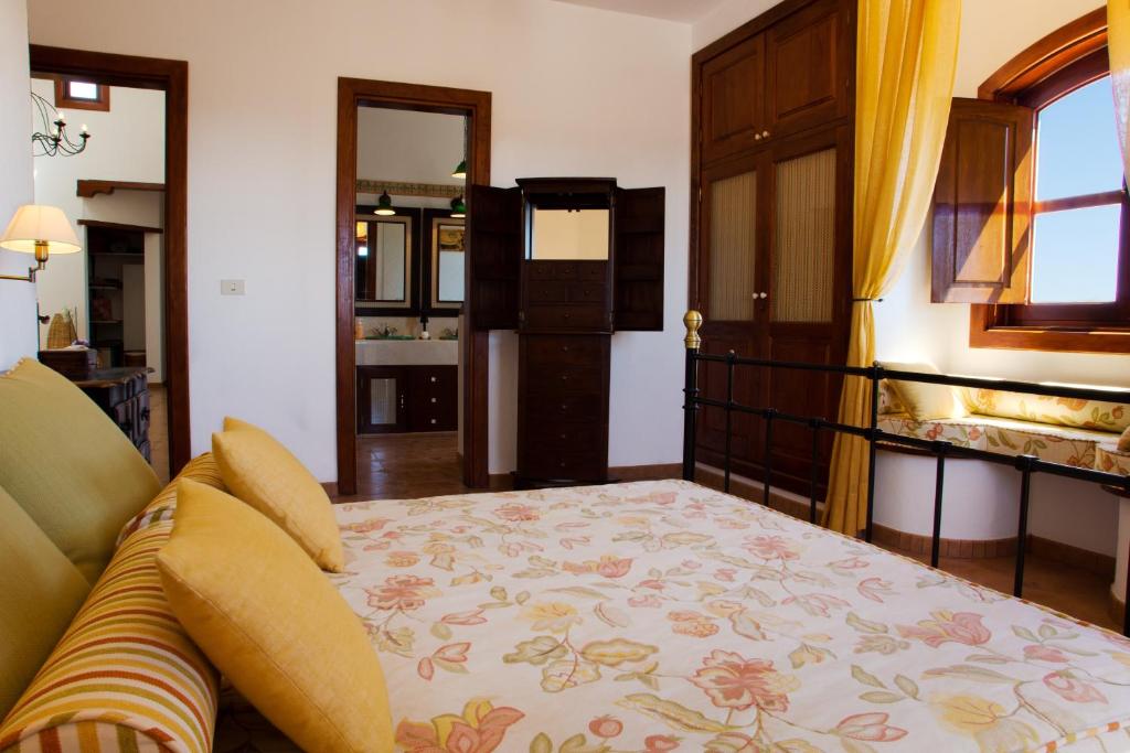 Postel nebo postele na pokoji v ubytování Villas Macher