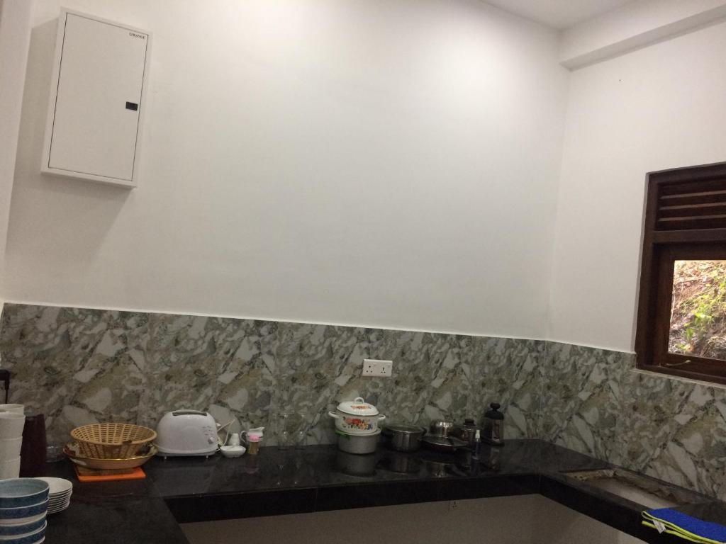 Kuchyň nebo kuchyňský kout v ubytování Villa Kaetana Lanka Unawatuna
