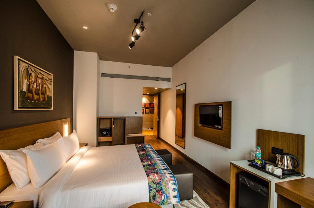 Postel nebo postele na pokoji v ubytování AltAir Boutique Hotel