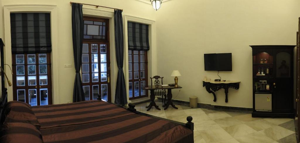 TV a/nebo společenská místnost v ubytování The Harrington Residency