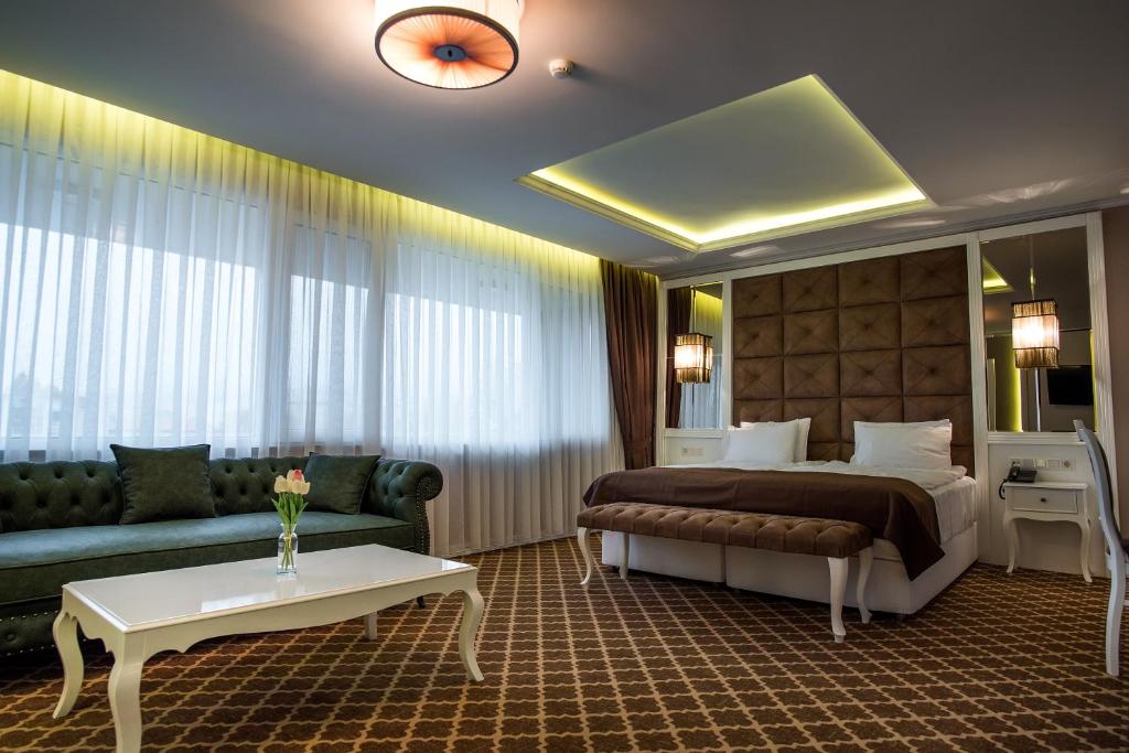 Postel nebo postele na pokoji v ubytování Hotel Arpezos