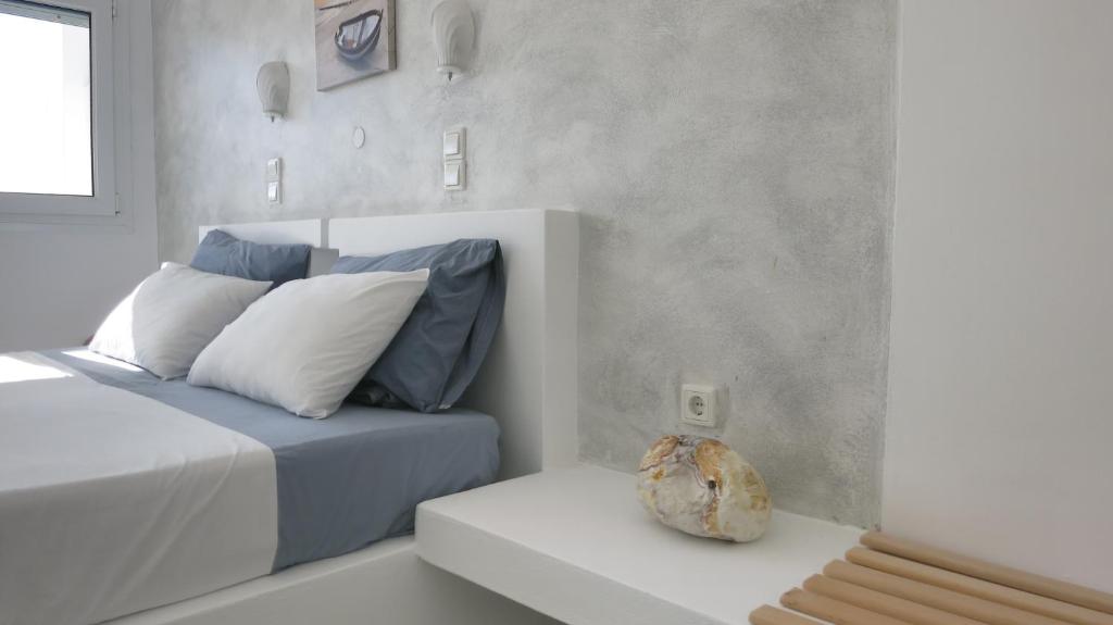 Postel nebo postele na pokoji v ubytování Lagada Beach Hotel
