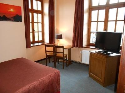 TV a/nebo společenská místnost v ubytování Hotel IL Castellino